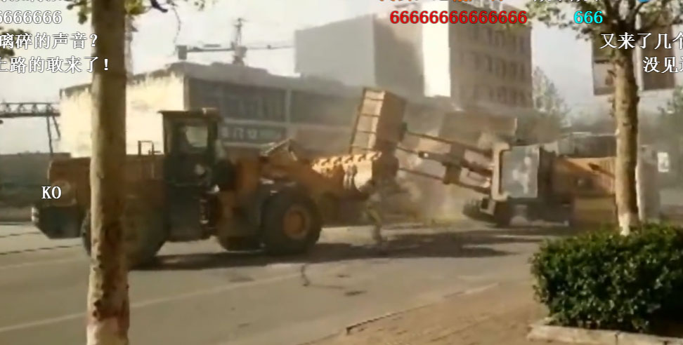 Frontloader brawl ensues in China over construction contracts.
