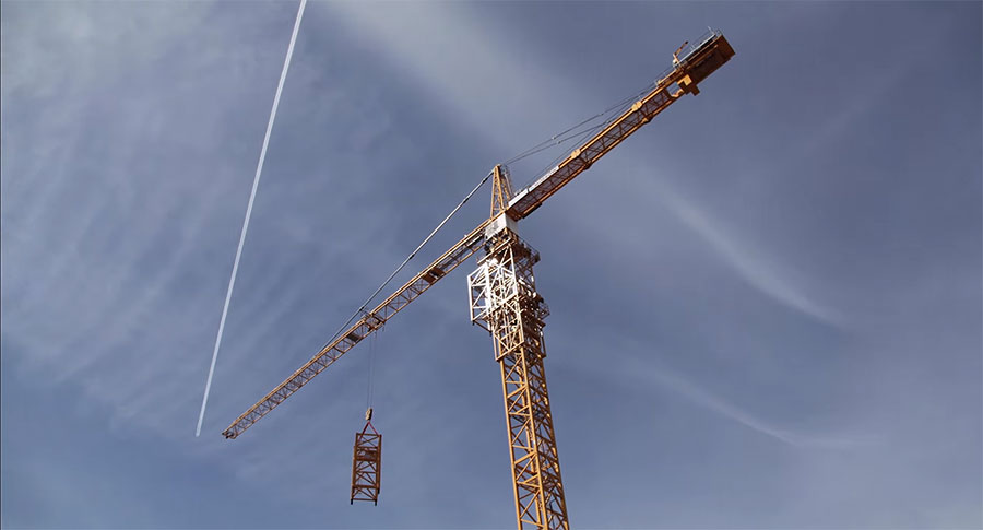 Watch a sweet time lapse video of how a tower crane climbs to add new mast sections