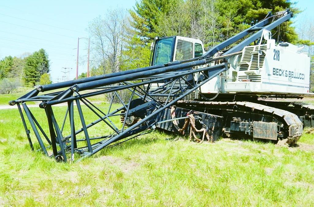 Worker injured after 110-ton crawler crane base boom fails.