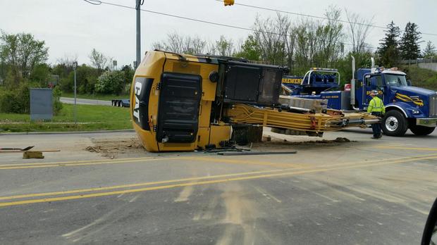 CAT Excavator falls off trailer in Ann Arbor, Michigan