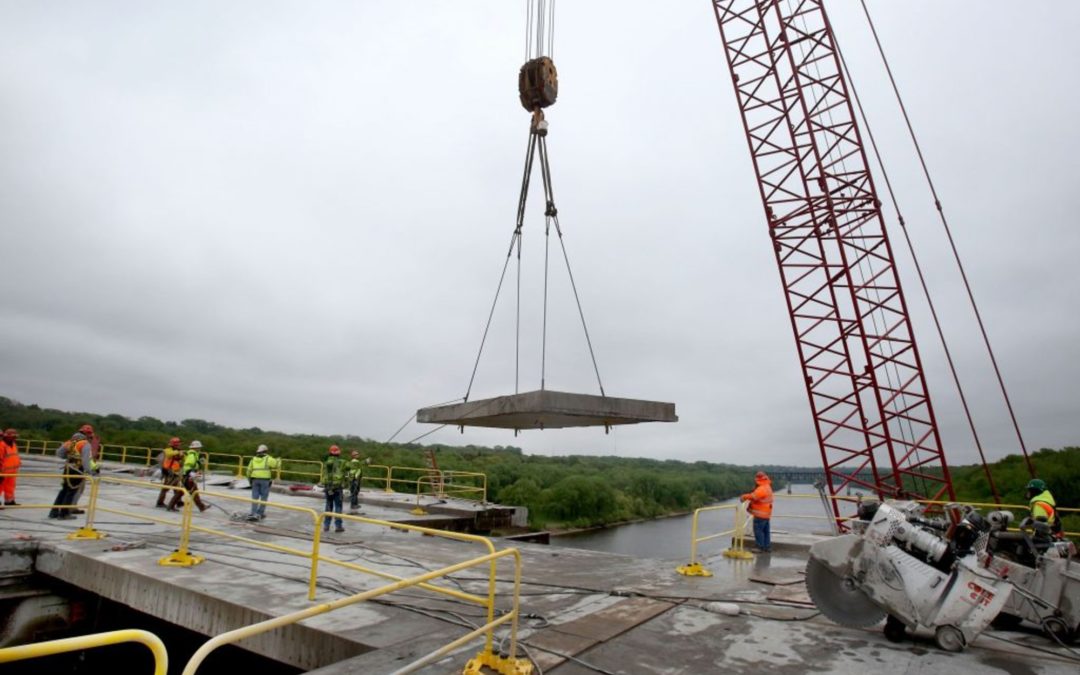 Kraemer North America bridge work engineers credited with accelerating construction.