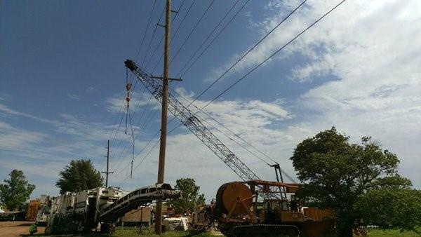 Crawler Crane hits powerlines causing major power outage in Stillwater, OK.