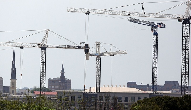 Construction cranes soar over Charleston skyline