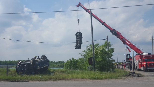 Mammoet uses an All Terrain crane to lift a pickup truck from the bottom of a Quarry following an accident.