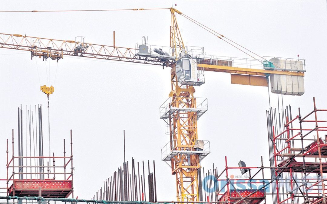 Perspectives of life from construction tower crane cabin in India