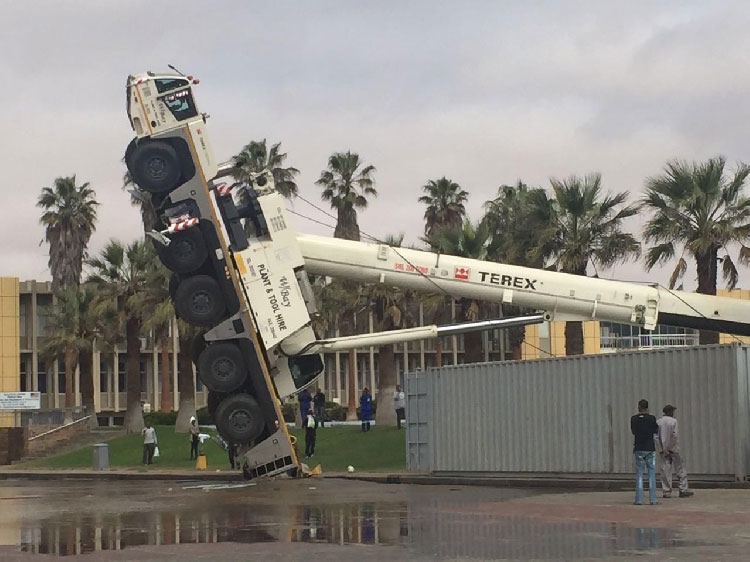In Nambia, a 5-axle Terex Crane sunk into a sinkhole and tipped over