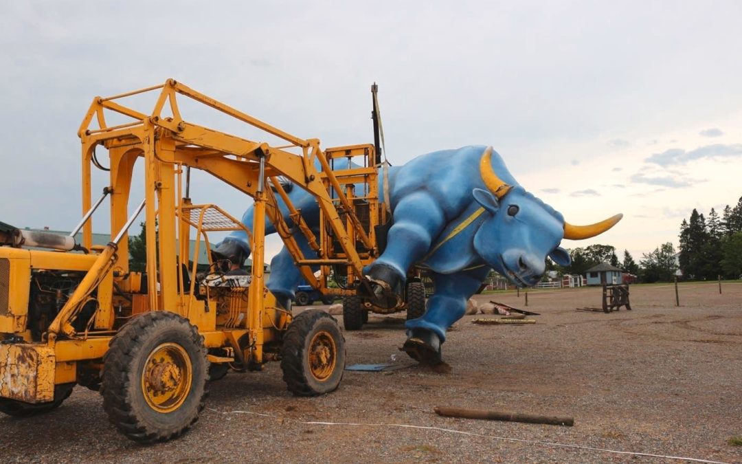 In Minnesota a famous Blue Ox is uprighted thanks to an old school forklift