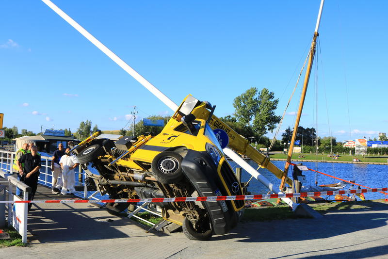 A Straight boom truck mounted aerial lift tipped over in Germany.