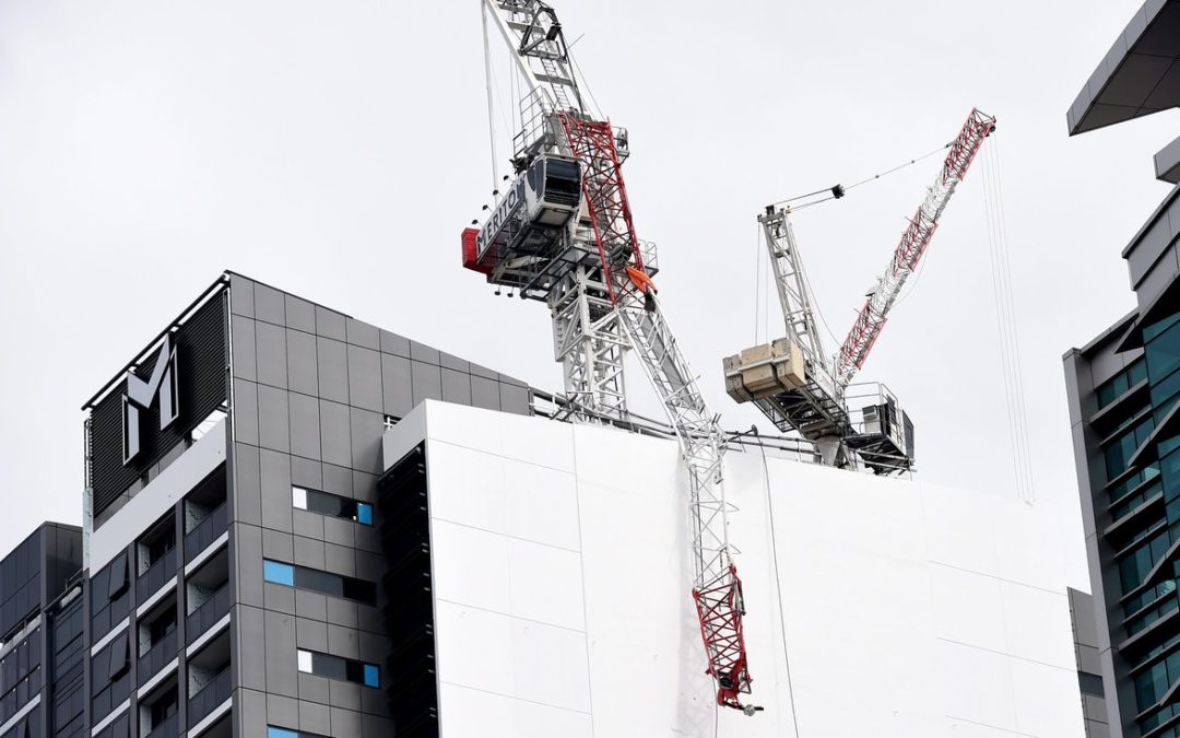 Sydney luffing jib tower crane collapses leaving three men dangling by safety harnesses