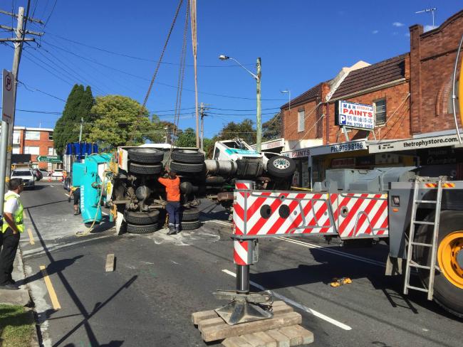 Action Cranes Liebherr LTM 1130-5.1 goes to work uprighting a overturned cement truck in Sydney, AU