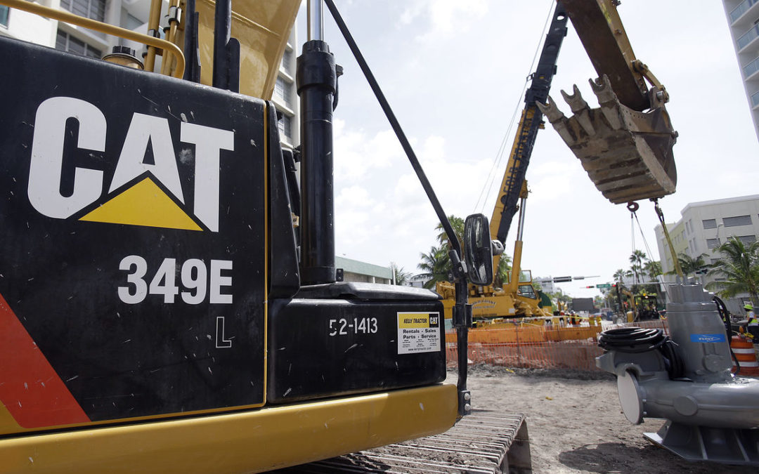 Caterpillar reports 4Q loss of $1.17 billion, or $2 per share.