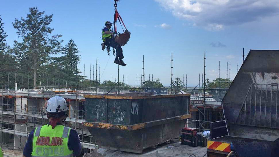 Tower Crane removes injured worker  in suburban, Sydney Australia