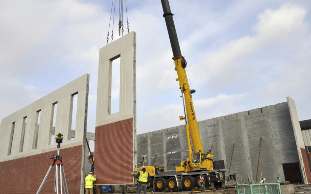 Dave’s Crane sets Precast Panels supplied by Wells Concrete with a Grove GMK5165-2 crane