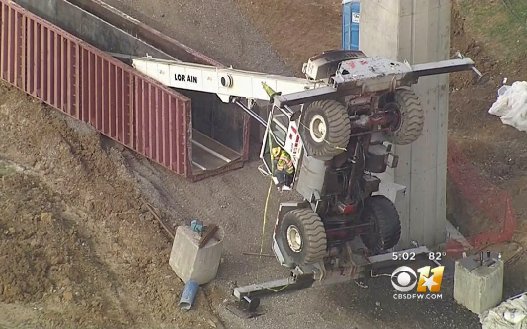 Operator error determined when a Lorain RT crane tipped over in the DFW area snarling traffic