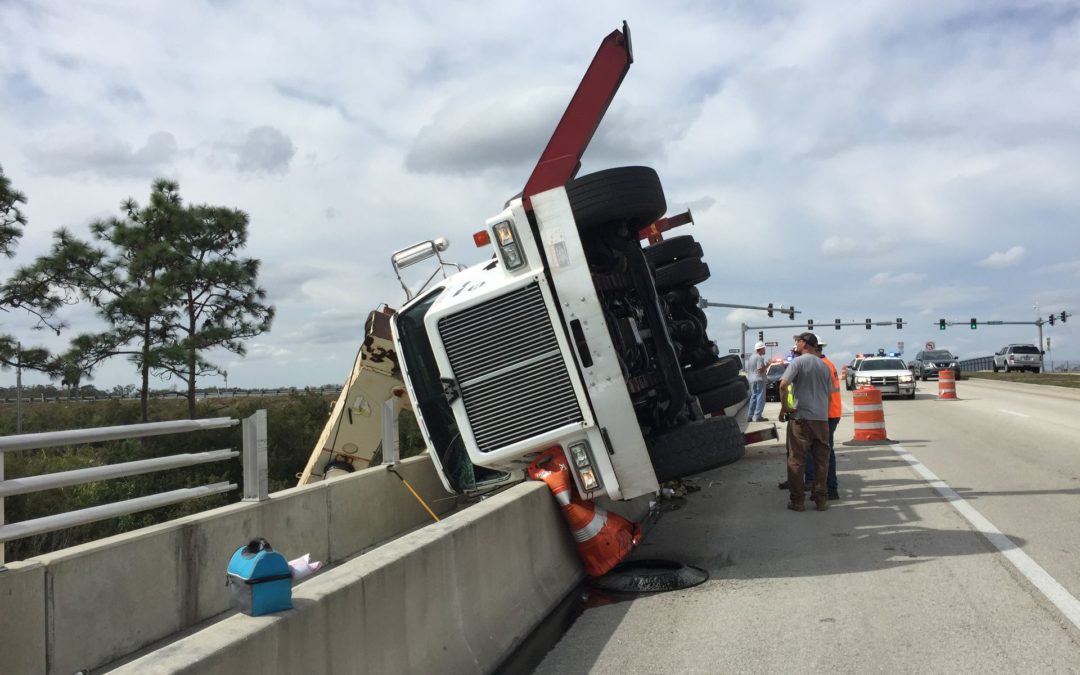 A Beyel Brothers Boom Truck Crane tips over, injures one in South Florida