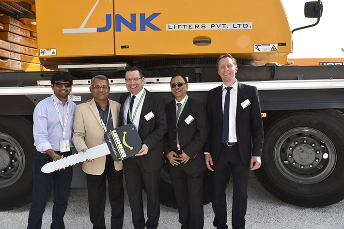 JNK Lifters takes delivery of Liebherr LTM 1250-5.1 mobile crane at the Bauma Conexpo India