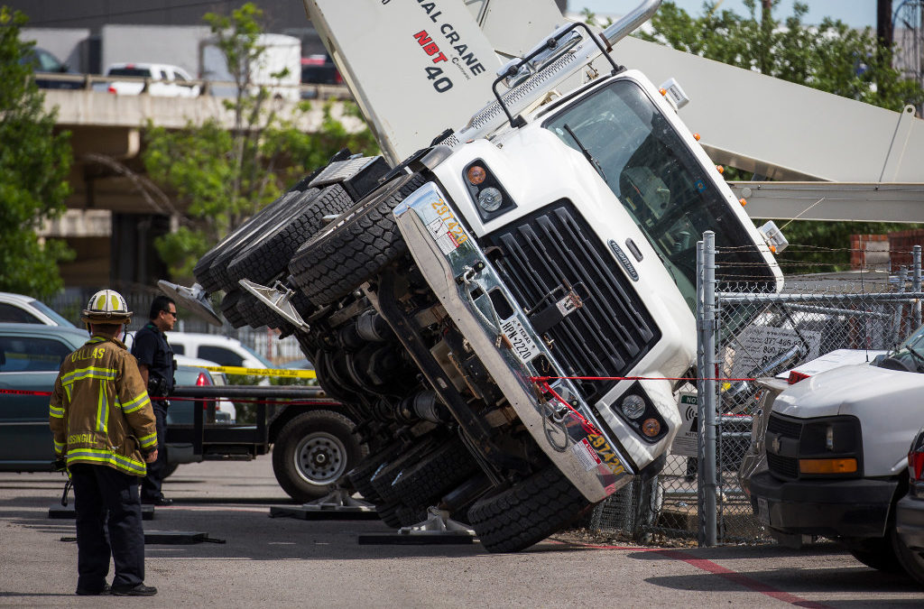 National NBT40 Boom Truck Crane Tips over in downtown Dallas killing one worker
