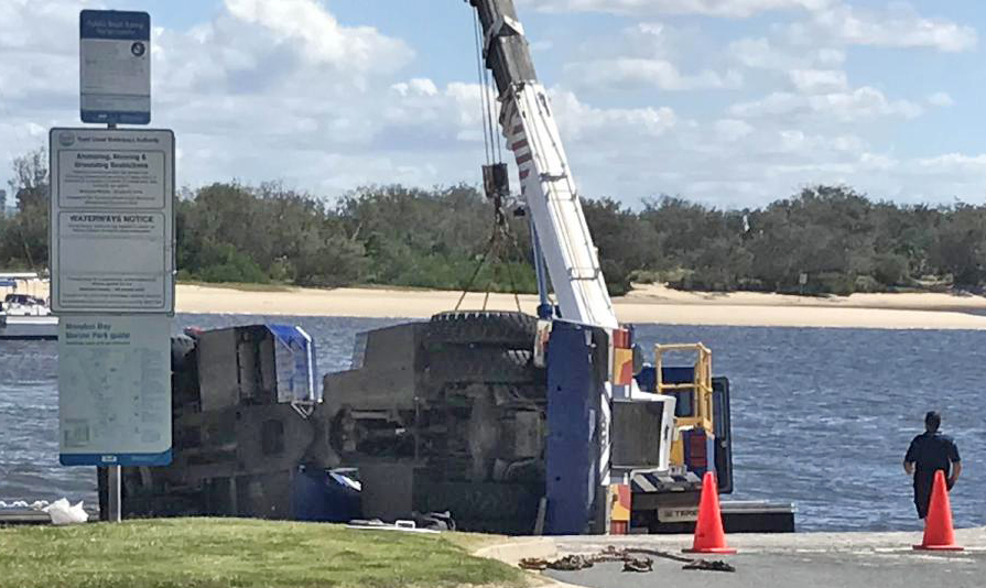 Pick N Carry crane topples over South of Brisbane in Eastern Australia