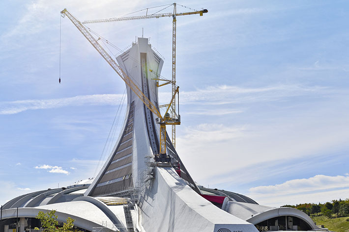 Montréal: Liebherr tower cranes stand above entrance into the Olympic Stadium