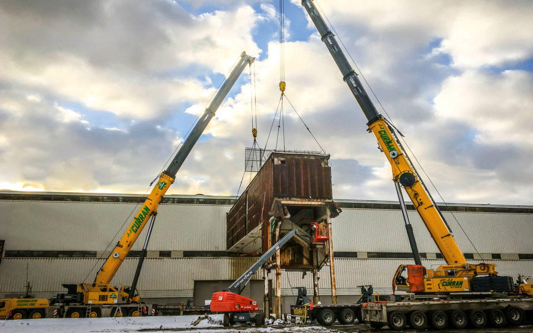 JJ Curran used a Grove GMK6300L and a GMK6400 to remove a 67.5-ton walkway in Detroit