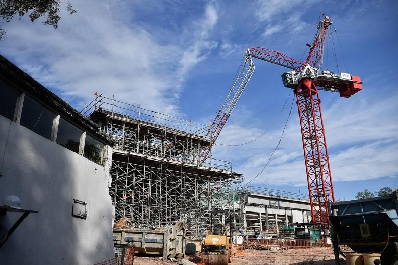 Engineers figuring out how to remove buckled Luffing Jib Tower Crane in Singapore