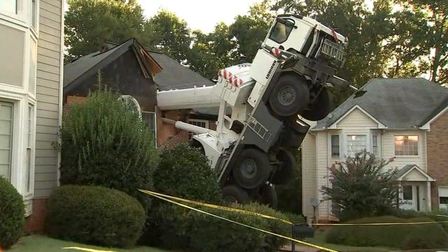 Southway Crane & Rigging cranes called in to upright a Liebherr crane that tipped over on a house near Atlanta, GA