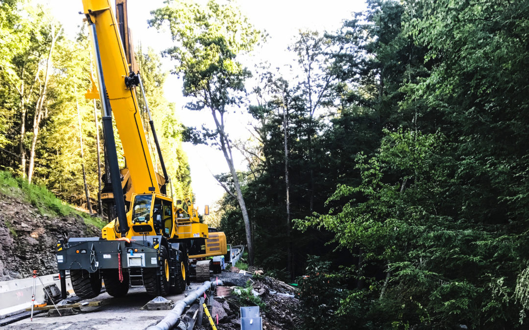 The new Grove GRT8100 Rough Terrain crane is working bridge construction for Kriger