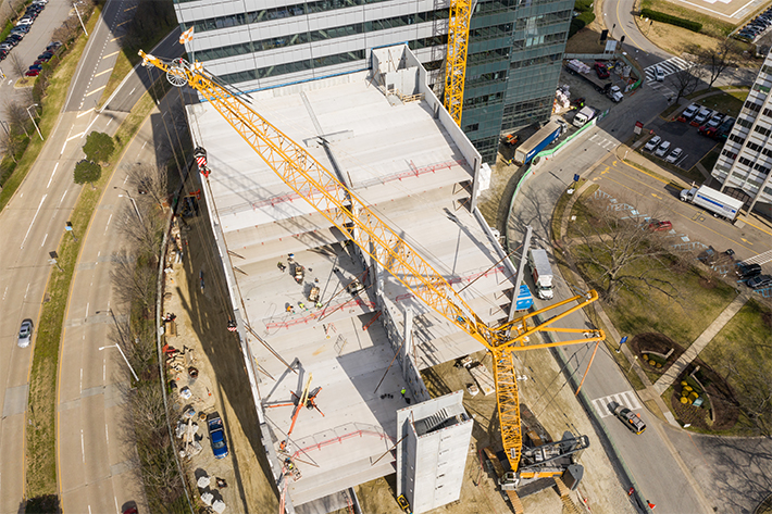 Liebherr LR 1300.1 SX Crawler Crane handles heavy lifting for Structural Unlimited parking garage lift job